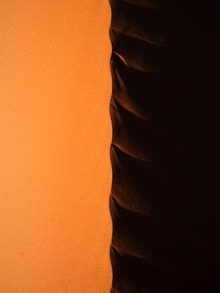 Sun rising over the dunes in the NamibRand Nature Reserve